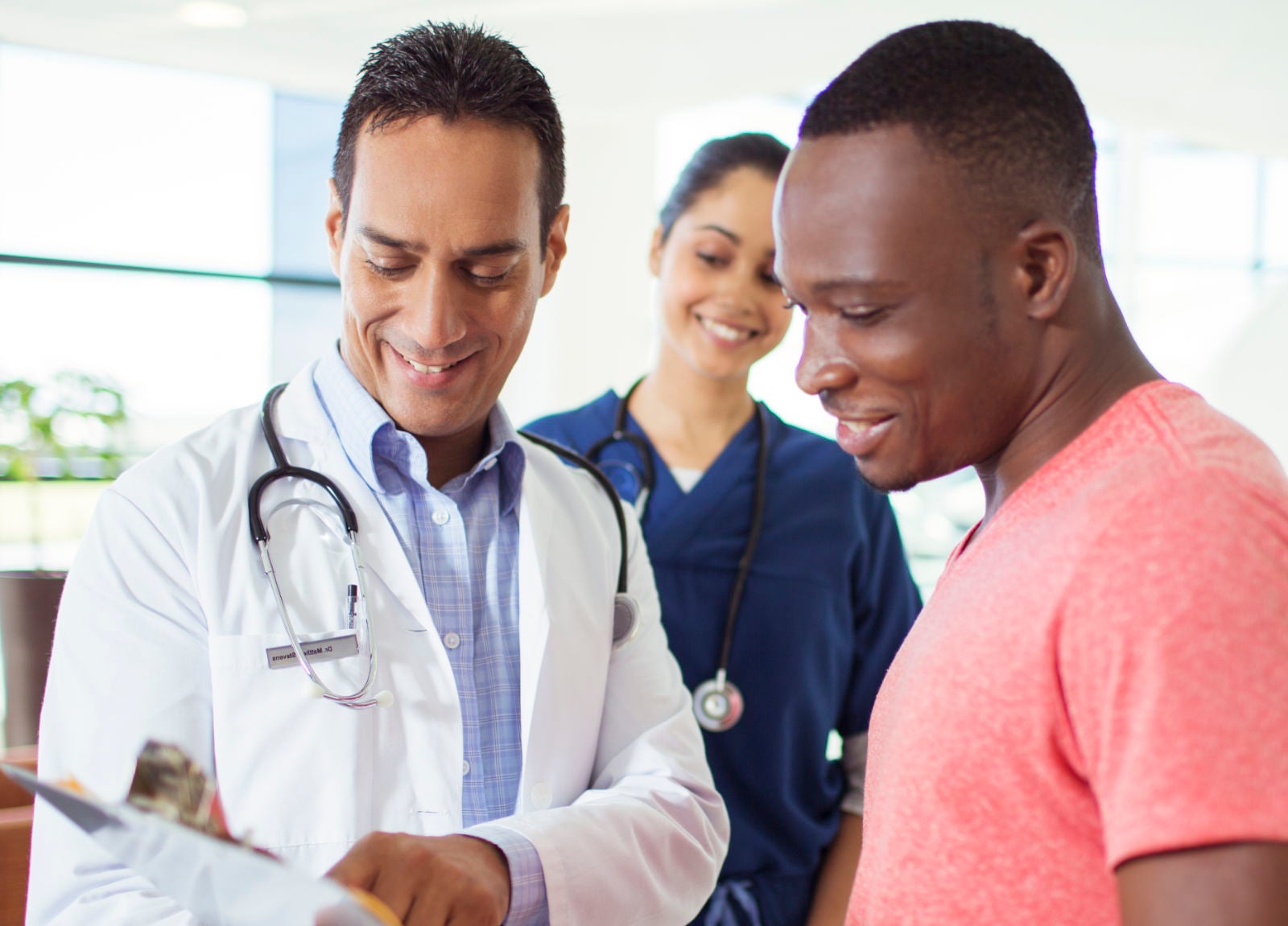 A doctor talking to his patient